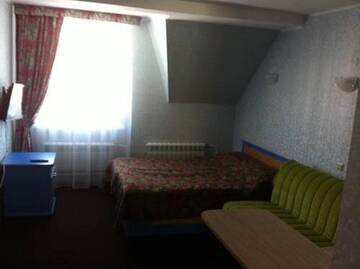 Фото номера Стандартный четырехместный номер Гостиница Metelitsa Guest House г. Шерегеш 4