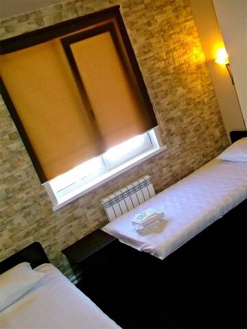 Фото номера Twin  Standart (Стандарт с двумя кроватями) Отель Western Hotel г. Шерегеш 10